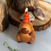Southlake Gifts Capybara Candle, artisanal handmade and hand-painted animal candle with signature orange topper, whimsical novelty décor gift