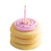 Southlake Gifts cake cookie candle isolated on white background, a handmade vanilla scented dessert candle with layered cookie design and pink frosting swirl, ideal as a unique birthday candle gift, cake topper candle, and novelty dessert candle for celebrations