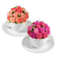 Southlake Gifts Dahlia Flower Teacup Candles, both orange and pink wax bouquets in porcelain cups with saucers, handmade floral décor candles in white background