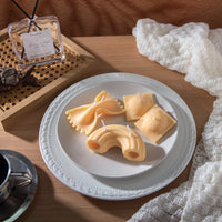 Southlake Gifts La Pasta Candle Collection, handmade pasta-shaped candles including Farfalle bow-tie, Ravioli 2-pack, and Rigatoni tube, vanilla scented
