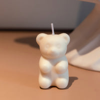 Southlake Gifts pink gummy bear candle on tabletop, handmade scented soy wax novelty candle, a cute gift idea for birthdays and home décor lovers.