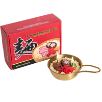 Southlake Gifts Ramen Noodle Candle gift set. Handmade realistic food candle in golden ramen pot with beef, mushrooms, scallions, and chili wax toppings plus gift ready packaging