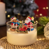 Handmade Christmas Candle with Santa, reindeer, and sleigh wax figures in glass vessel, festive holiday centerpiece by Southlake Gifts
