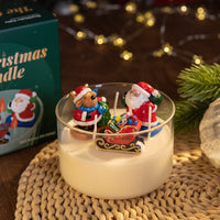 Festive Christmas Candle scene with Santa Claus holding gifts, reindeer carrying a tree, and sleigh full of presents sitting in the candle vessel, handmade scented décor