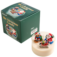 Southlake Gifts Christmas Candle comes in printed green holiday gift ready gift box and with Santa, sleigh, and reindeer wax melt figures inside glass vessel