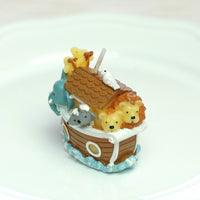 A cute little Noah's Ark Candle is perfect for your home.