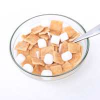 Top-down view of Southlake Gifts Cinnamon Toast Crunch Candle with realistic cereal and marshmallow wax melts — a handmade novelty candle that makes a delightful décor gift.