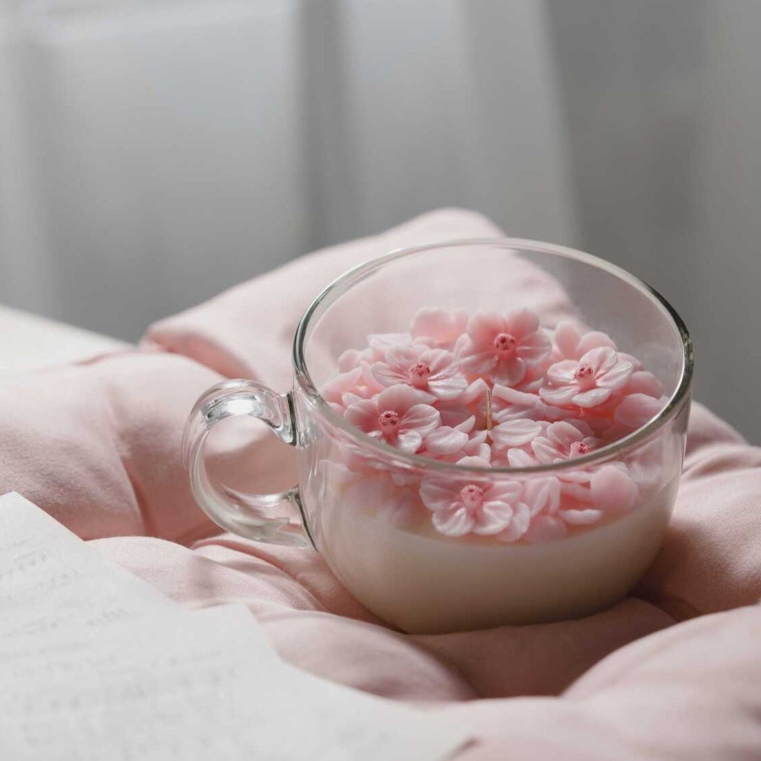 This Sakura Cup Scented Candle is perfect addition to any decor to your home.