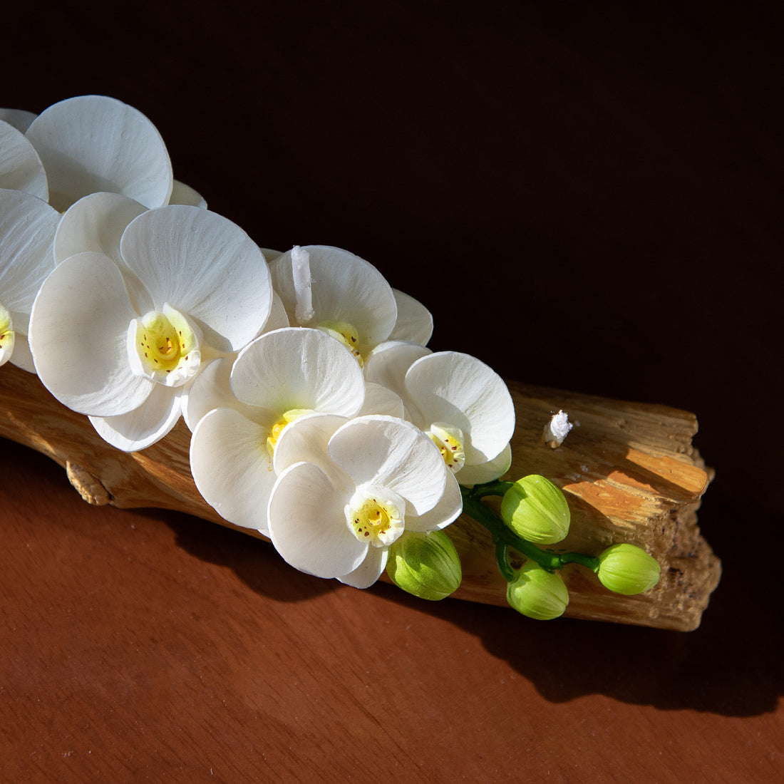 orchid arrangement candle