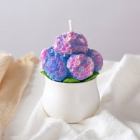 Handcrafted and handpainted Hydrangea Candle in purple mix with white and pink from Southlake Gifts. Adding elegance home decor candle to your space