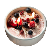 Acai Novelty Food Candle lit up is from Southlake Gift in white background. 