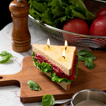 Southlake Gifts Bacon Lettuce Tomato Sandwich Candle handmade food candle lit on wooden board with fresh basil leaves, scented novelty décor