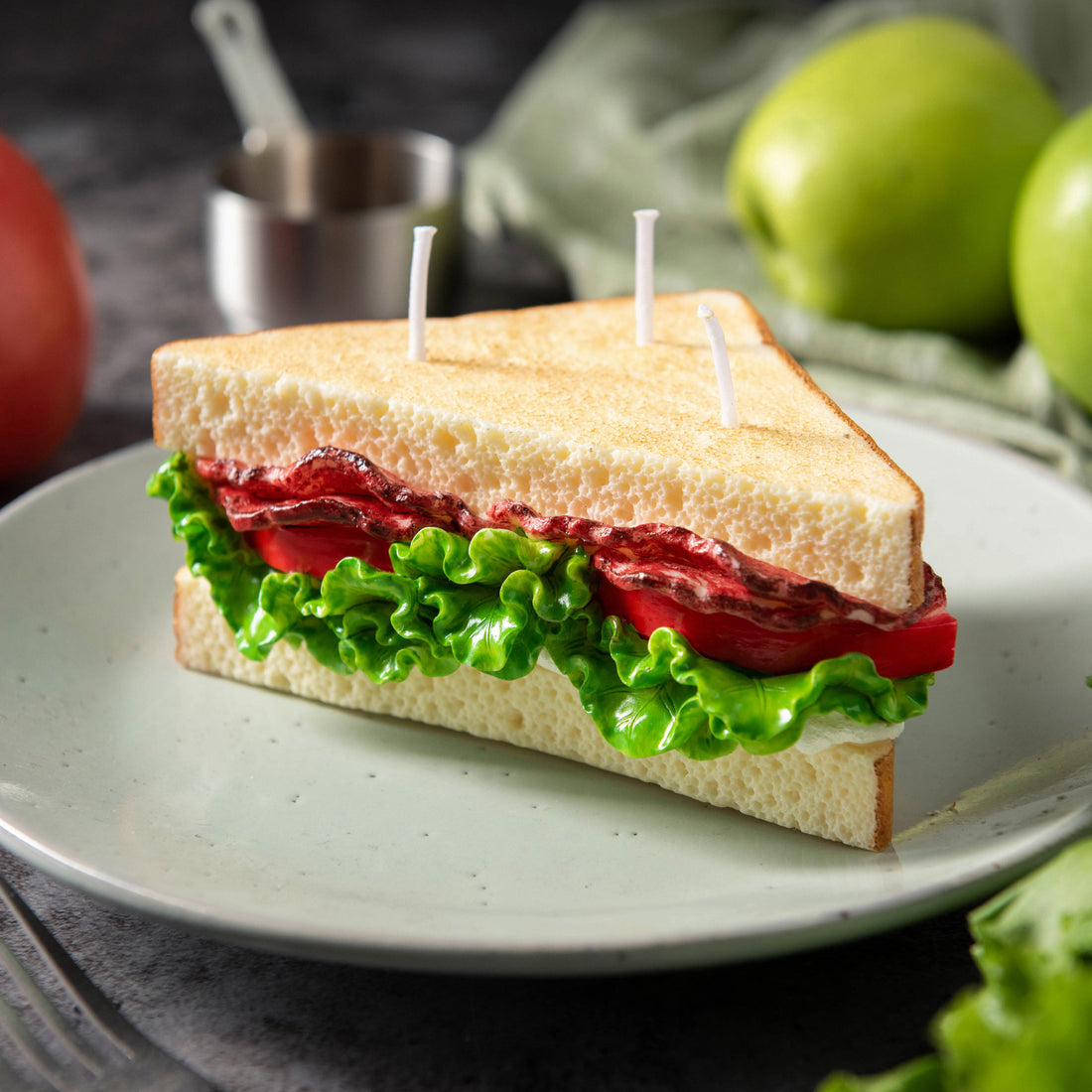Southlake Gifts BLT Sandwich Candle handmade soy wax candle with lettuce and tomato layers displayed on ceramic plate, unique food décor gift