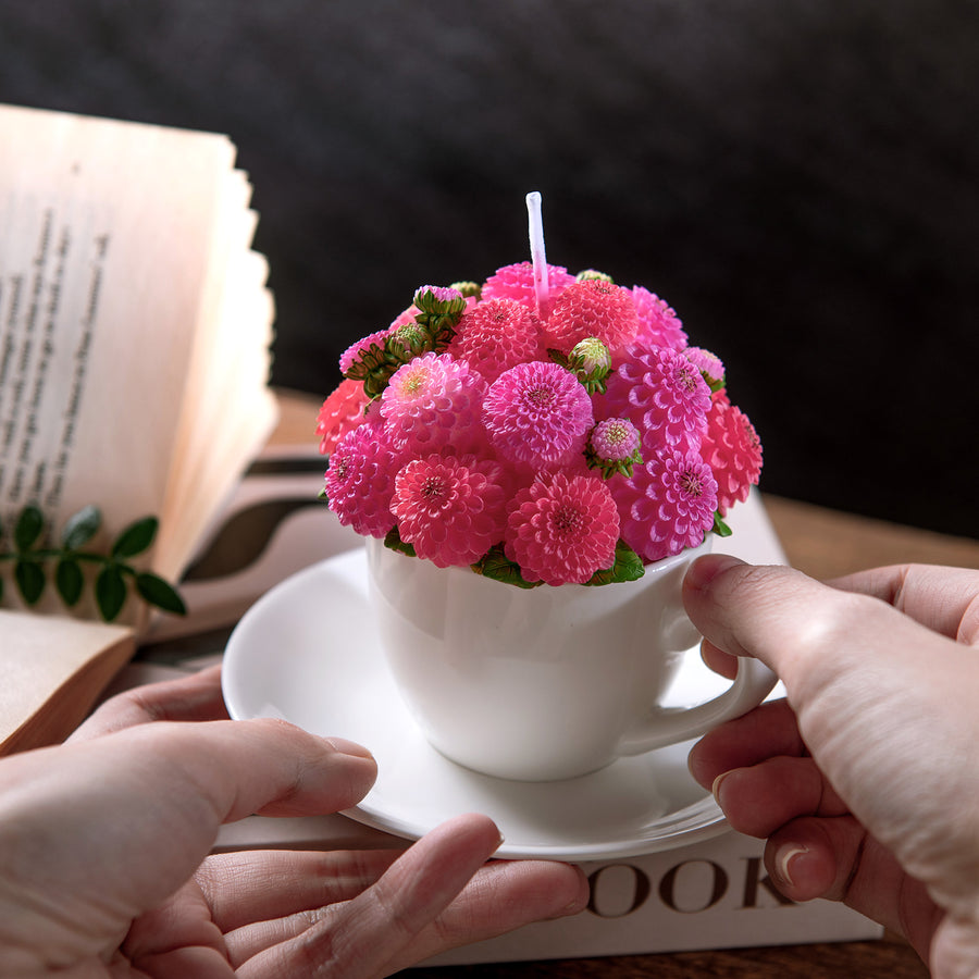 A detail look of the pink handmade Dahlia Flower Teacup Candle from Southlake Gifts