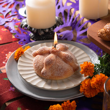 Southlake Gifts handmade Pan de Muerto Candle, realistic bread-shaped vanilla scented candle with sugar wax coating styled for Día de los Muertos altars.