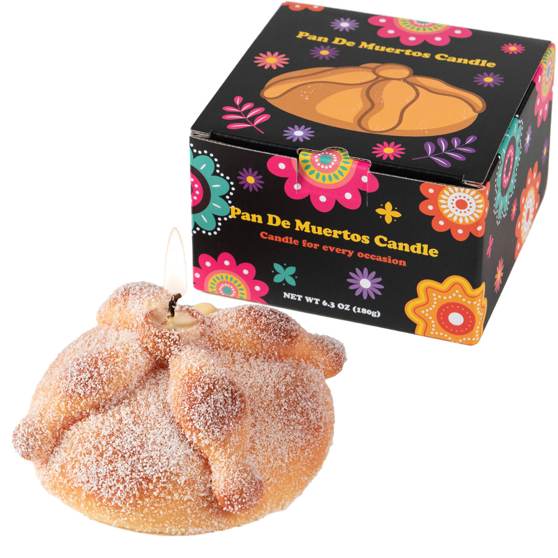 Southlake Gifts Pan de Muerto Candle gift set. Handmade vanilla scented bread candle with sugar wax detail in Día de los Muertos themed packaging box.
