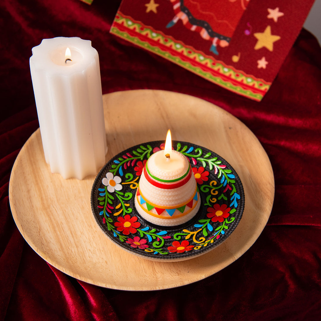 Southlake Gifts Fiesta Sombrero Candle styled on a wooden tray with decorative background elements, a festive Mexican hat candle designed for colorful table decor, celebrations, taco nights, and unique handmade gifts.