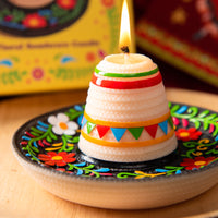 Close-up of the Southlake Gifts Fiesta Sombrero Candle with a glowing flame, highlighting the sculpted Mexican hat shape and colorful fiesta details, a handcrafted decorative candle perfect for Cinco de Mayo parties, festive celebrations, and unique gift ideas.