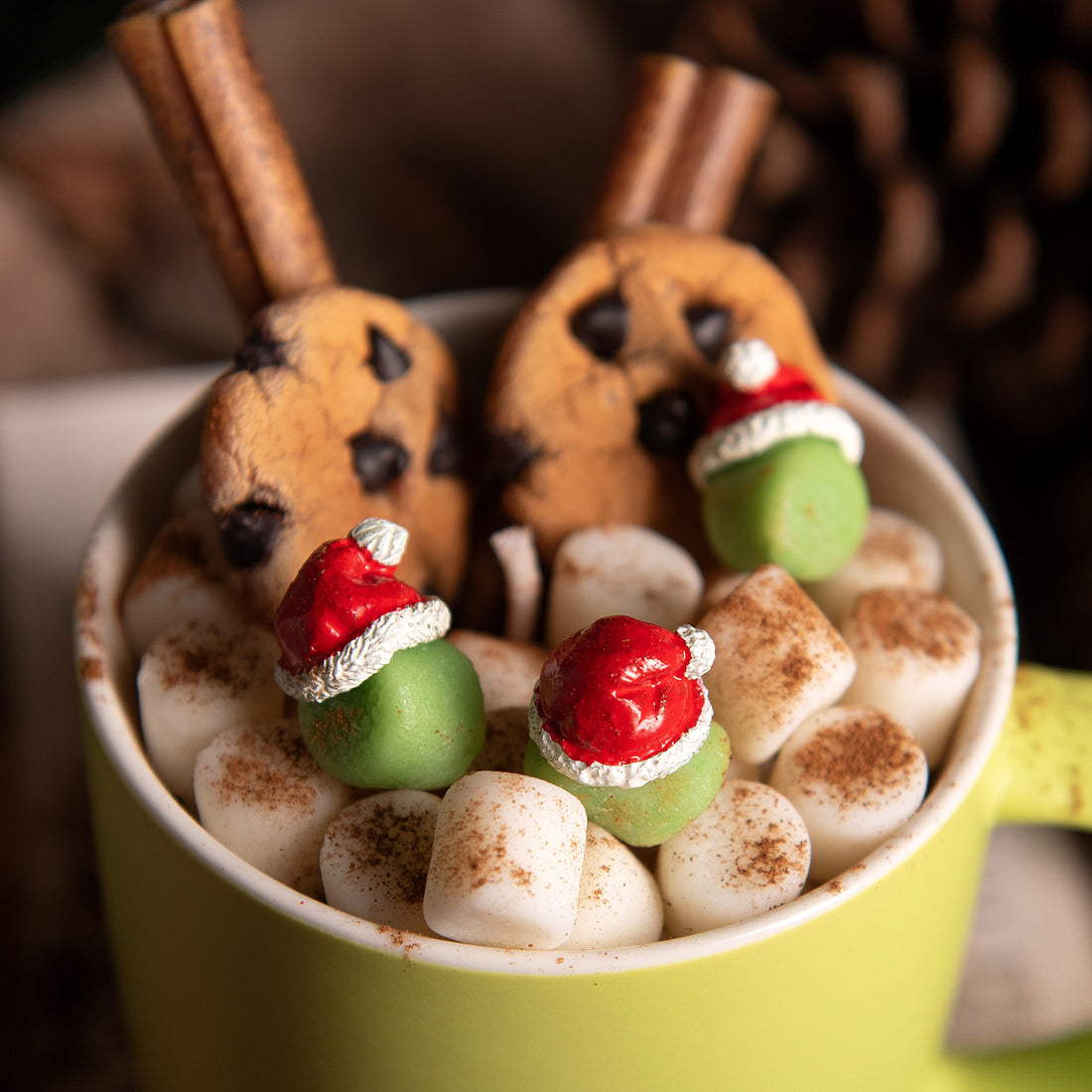 Close-up of soy wax cookies and marshmallows inside the holiday cocoa candle mug — handcrafted by Southlake Gifts for realistic winter holiday candle décor gifts. 