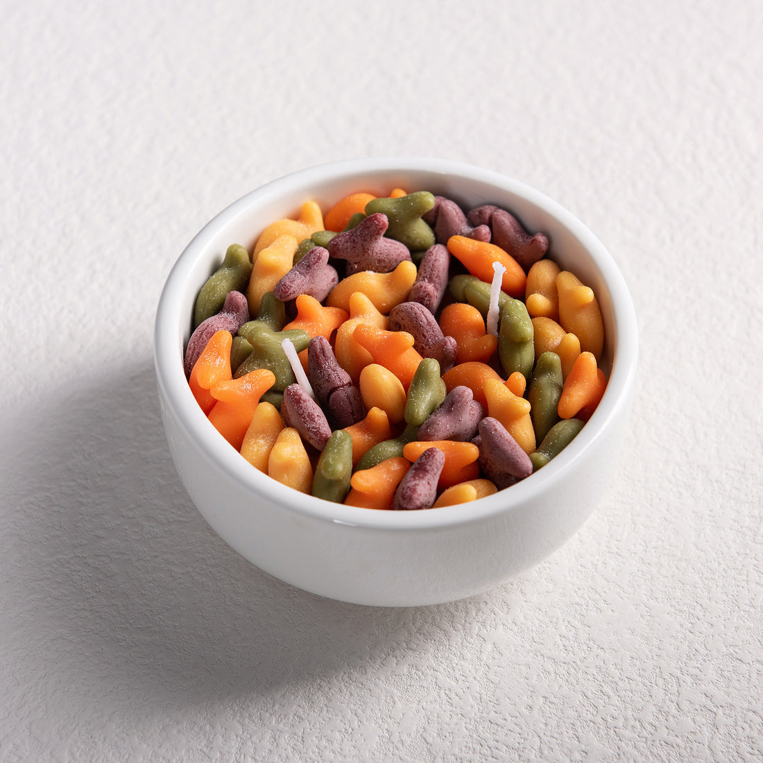 Studio shot of Southlake Gifts Fish & Crackers Candle Bowl on white background, showing realistic food-inspired soy candle design, a unique artisan gift for candle lovers.