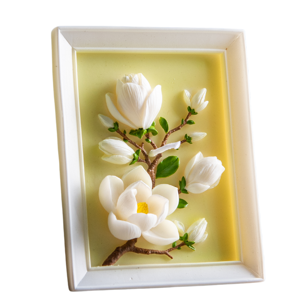 Southlake Gifts framed Magnolia Floral Candle in a white background. 