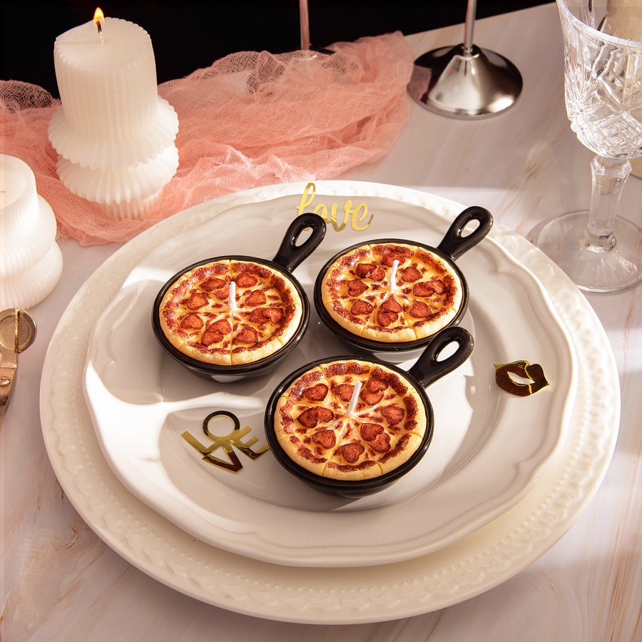 Southlake Gifts Heart Pepperoni Mini Pizza Candle Trio arranged on a white plate with soft romantic décor and gift-ready packaging in the background, showcasing realistic food candles shaped like mini pizzas with heart pepperoni, ideal for gifting during holidays, weddings, or housewarmings.