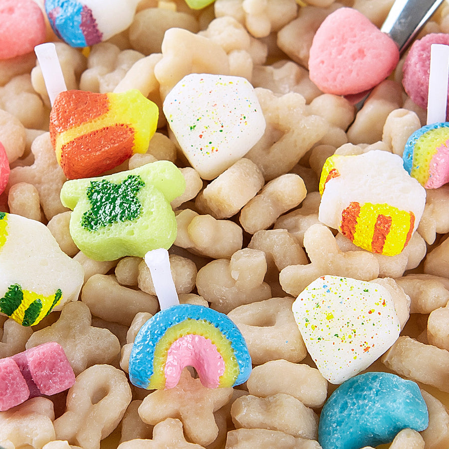 Detailed view of the Lucky Charms Cereal Candle 2.0 featuring rainbow, unicorn, and clover wax charms — realistic hand-painted soy candle that captures breakfast nostalgia, a perfect handmade gift for candle lovers.
