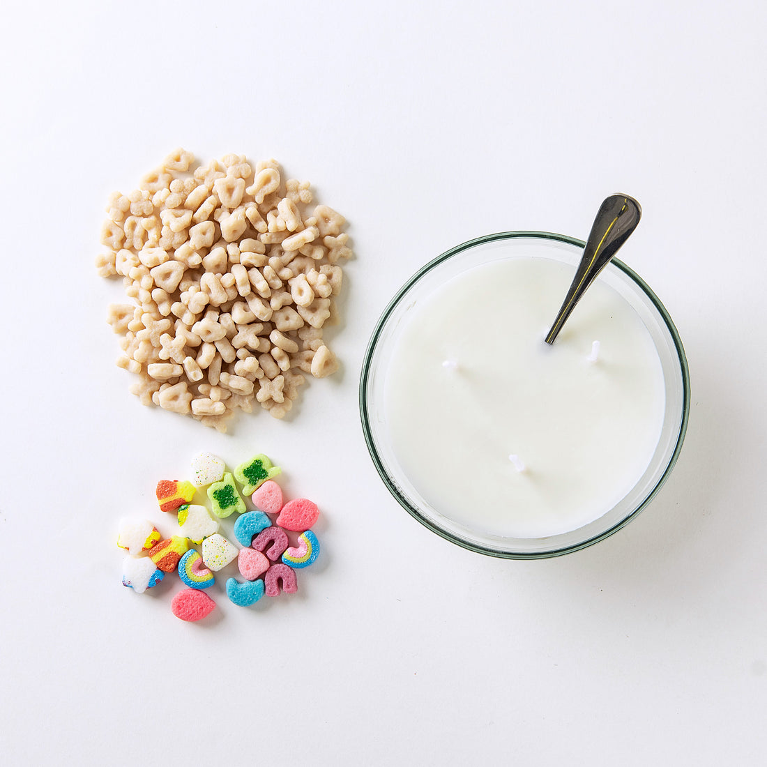 Southlake Gifts Lucky Charms Cereal Candle 2.0 shown with soy wax base and colorful cereal wax melts including rainbows, unicorns, and clovers beside the bowl — a handmade novelty candle that looks just like the real cereal, perfect for gifting to candle lovers and collectors.