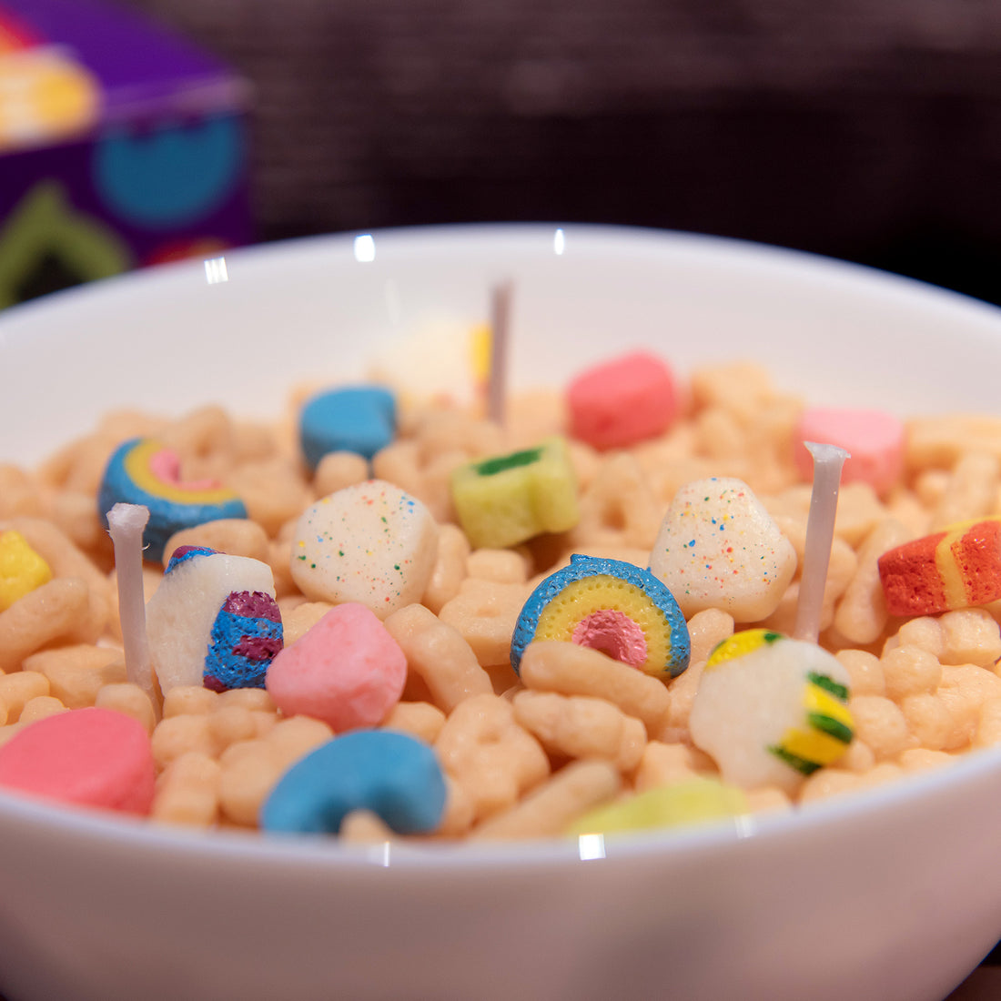 a closer look at Southlake Gifts Lucky Charms Cereal Candle 3.0 with handcrafted rainbow, clover, heart, and moon wax melts, playful novelty candle décor