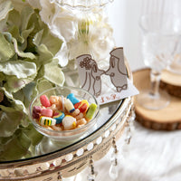 The mini cereal candle and the greeting card from the Mini Lucky charms cereal candle set. 