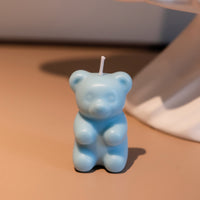 Southlake Gifts blue gummy bear candle standing upright, scented novelty candy-inspired candle made from soy wax, a charming gift for candle lovers and fun décor fans.