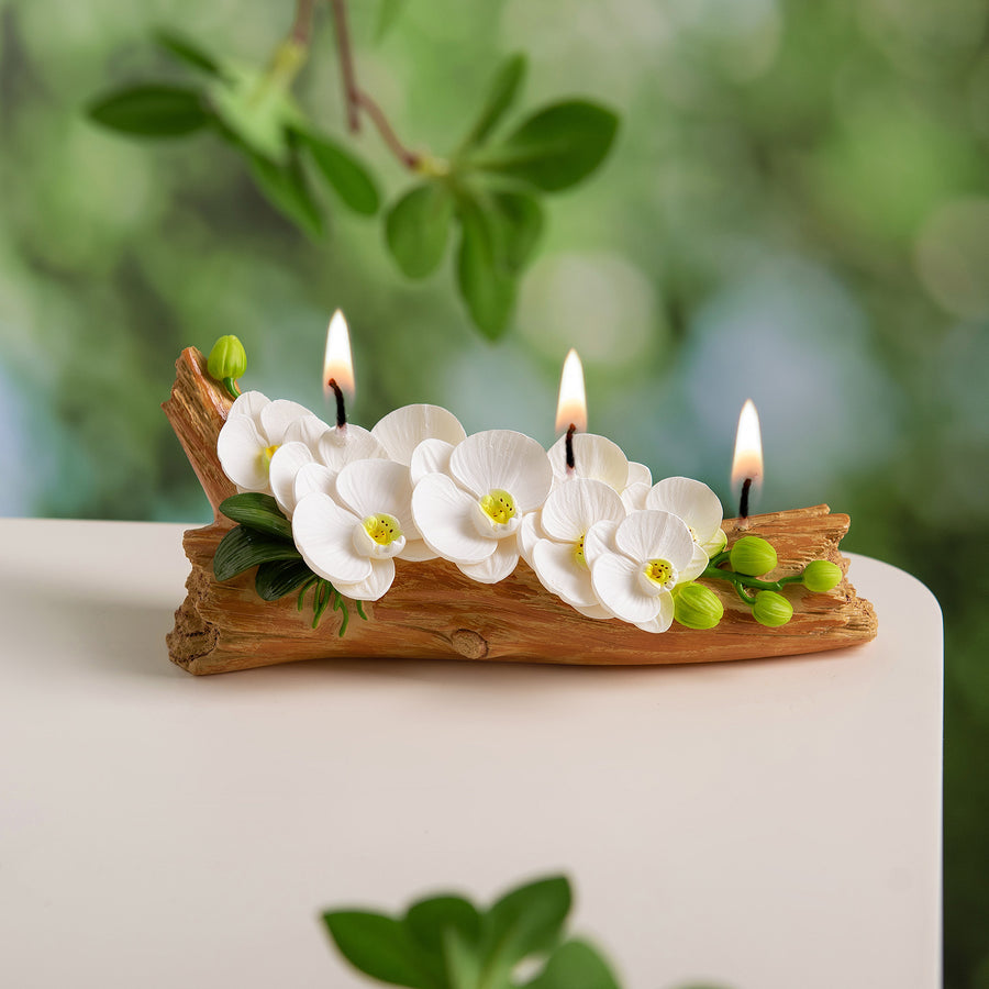 Southlake Gifts Orchid Flower Arrangement Candle lit with glowing flames on all three wicks, handmade soy wax orchids on realistic wood base which is also made by wax, truly a luxury floral centerpiece décor for everyday. 
