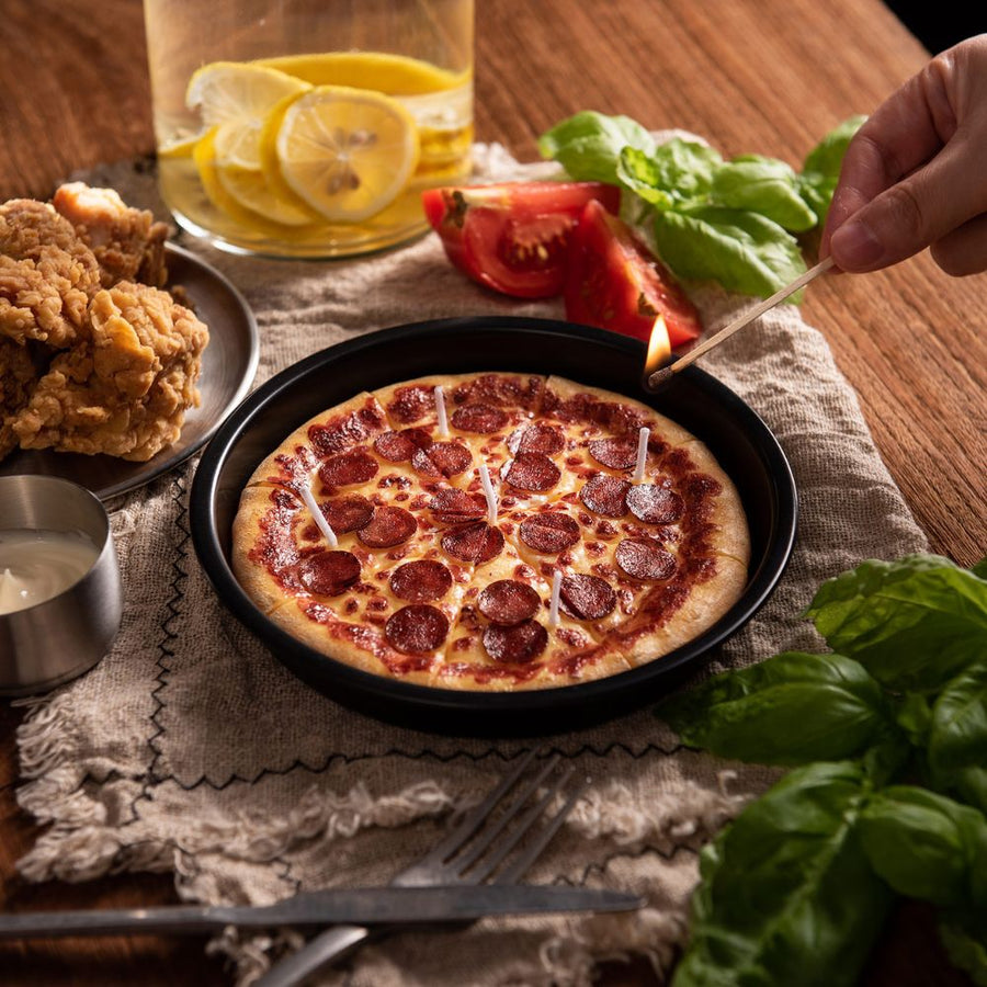 lighting up the pizza candle