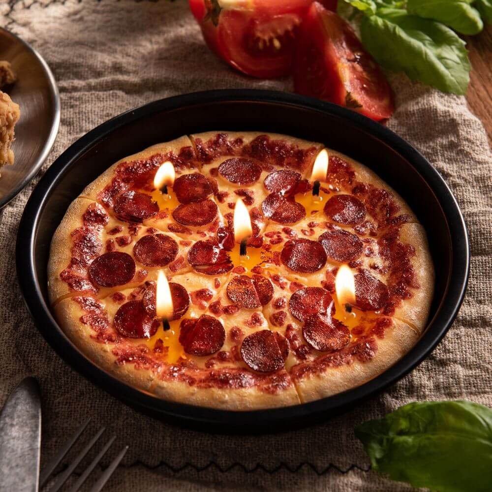 A close look of pizza candle when lighted. 