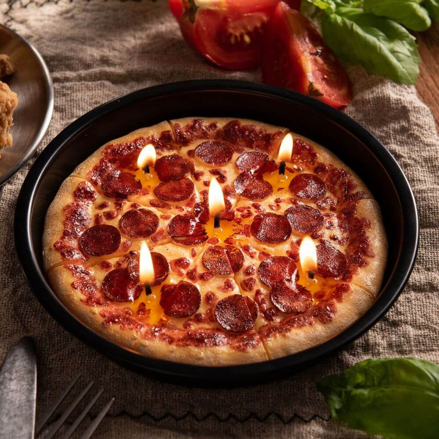 A close look of pizza candle when lighted. 