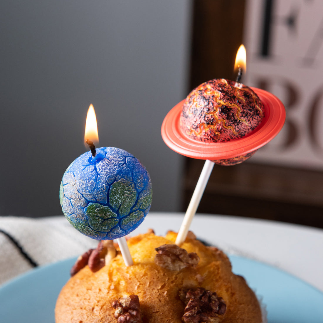 Southlake Gifts planet cake topper candles close up, realistic Earth and Saturn design, handmade unscented candle set for space theme birthday, science lover gift and unique cake decoration