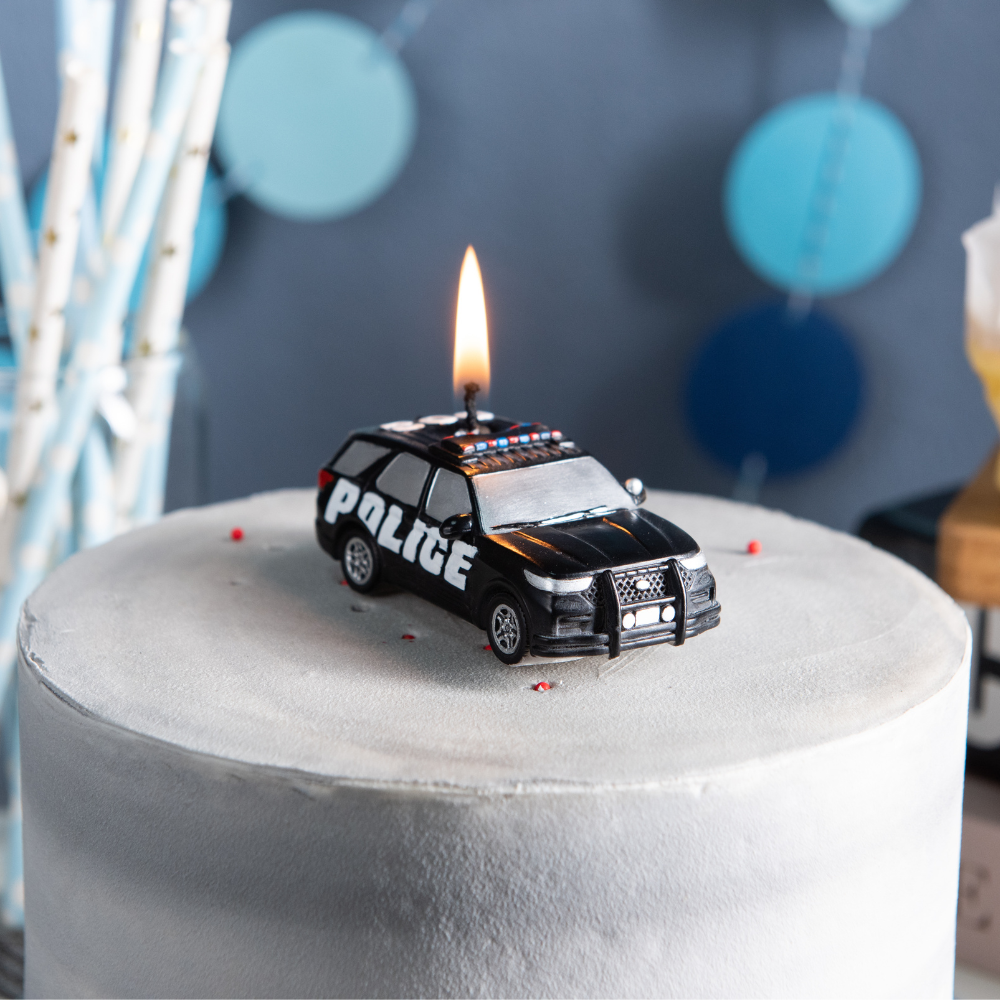 Southlake Gifts police car candle on birthday cake as cake topper, police themed birthday decoration with lit patrol car candle, novelty handmade candle for kids police party, cop theme celebration and first responder gift