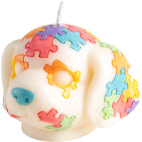 Southlake Gifts Puppy Puzzle Animal Candle shaped like a dog with hand-painted colorful puzzle pieces on a white background