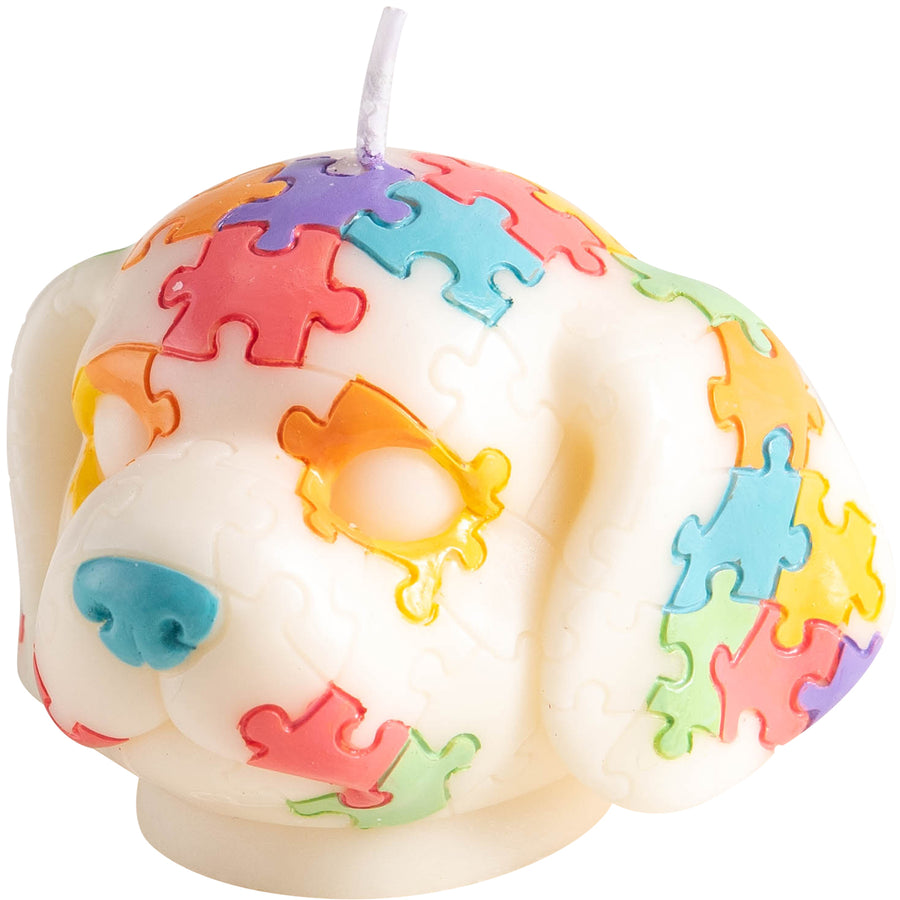 Southlake Gifts Puppy Puzzle Animal Candle shaped like a dog with hand-painted colorful puzzle pieces on a white background