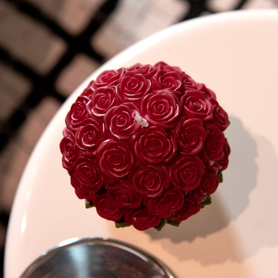 Bird's-eye view of the Southlake Gifts Rose Bouquet Candle, featuring a top view of 33 red roses, a realistic, handmade floral candle perfect for wedding and romantic holiday decoration gifts. 