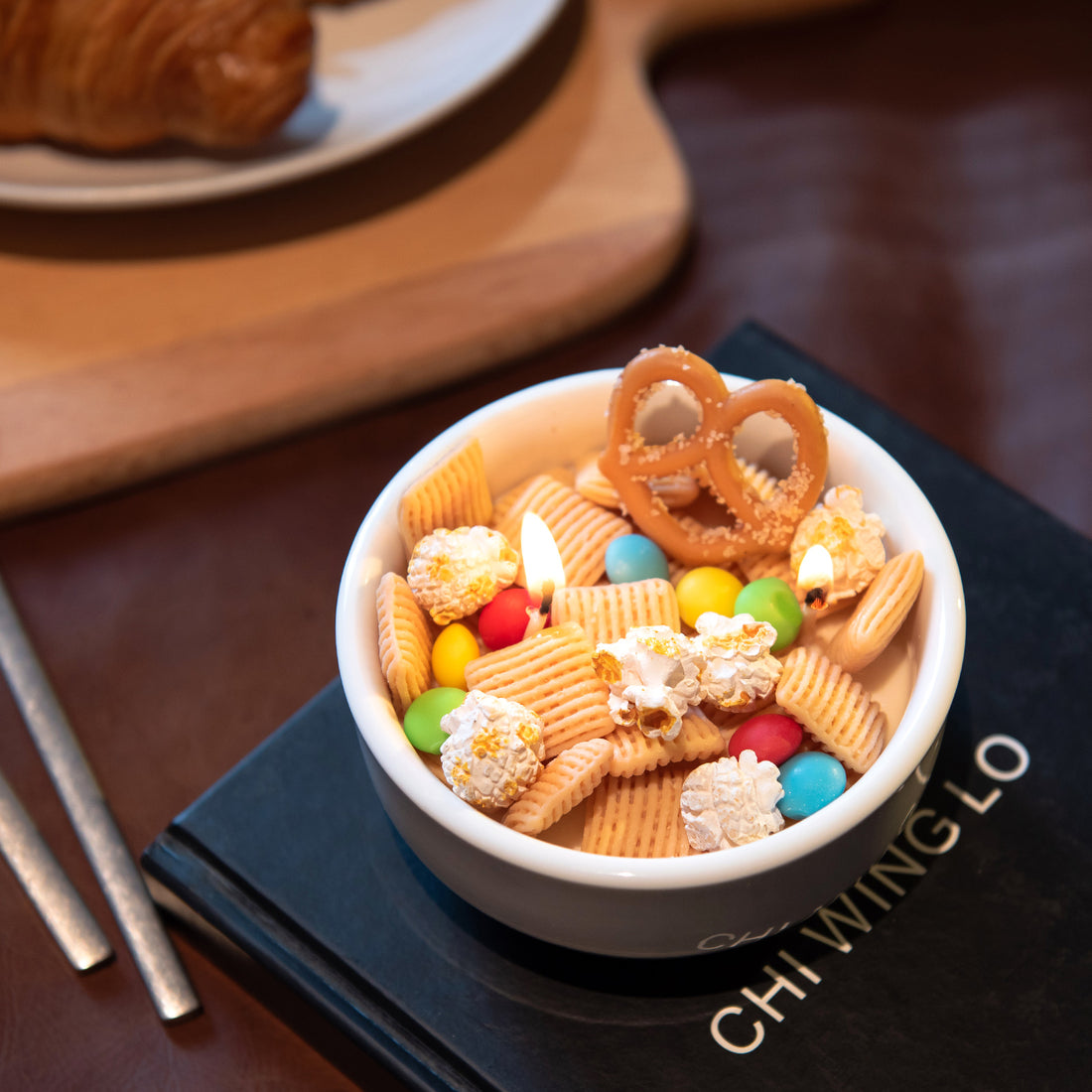 Top view of Southlake Gifts handmade Snacks Candle Bowl with assorted snack-shaped wax elements, blending whimsical realism with modern home décor, an eye-catching candle ideal for gifting during holidays or housewarmings.