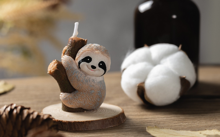 Give light to your life using our Baby Sloth Candle.