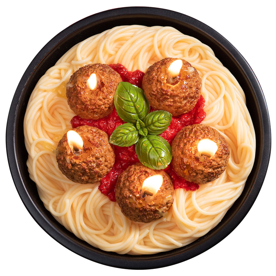 Birdeye view of the Southlake Gifts Spaghetti and Meatball candle with all five wicks are lit in a white background. 