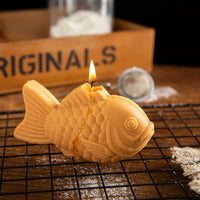 Southlake Gifts taiyaki candle with melted wax detail, showcasing the realistic texture of a traditional Japanese fish pastry, a handcrafted candle designed for those who appreciate unique artisan decor