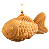 Southlake Gifts taiyaki candle isolated on white background, a realistic Japanese fish shaped candle designed as a creative gift, novelty decor piece, and unique handmade candle
