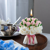 Southlake Gifts tulip bouquet candle lit and displayed on a tray, a realistic handmade floral candle with pink and white tulips, bouquet wrapping, and ribbon, ideal as a wedding gift, Mother’s Day gift, or decorative home décor candle.