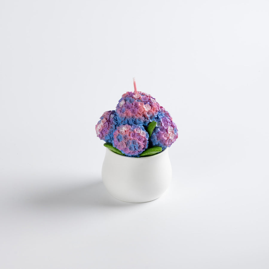 Hydrangea floral candle from Southlake Gifts is handmade and hand-painted which make a perfect holiday flower candle gifts. 