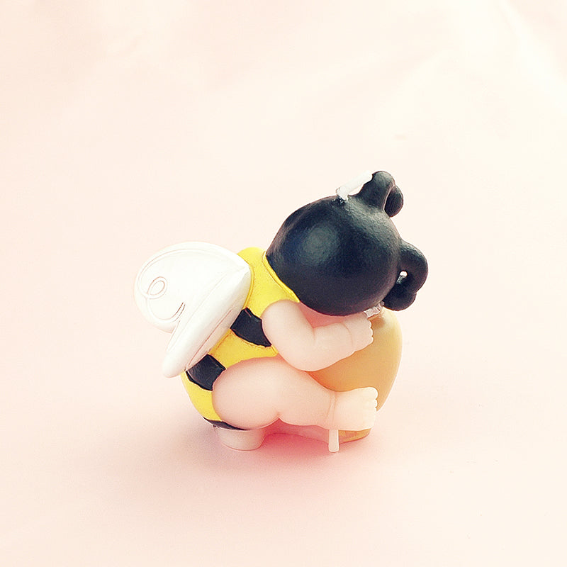A sleeping Bee Baby Candle that will light up your night,