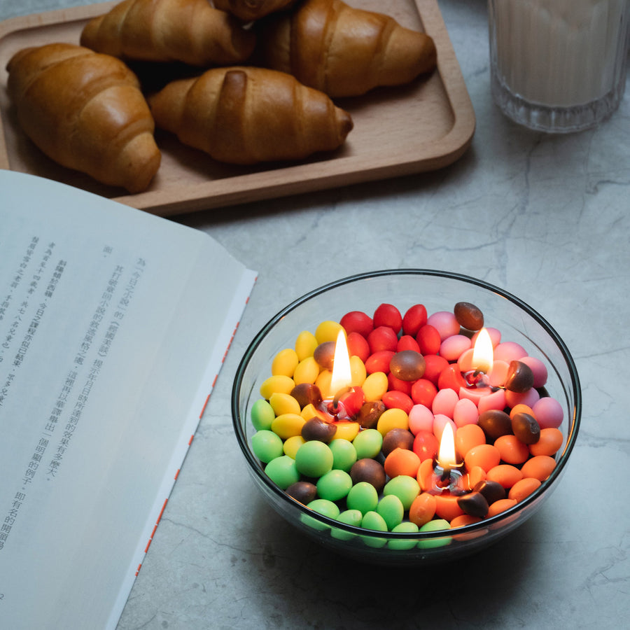 Time to fade the darkness with this Colourful Rainbow Sugar Bowl Candle.