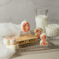 Burn a Colorful Sprinkle Candy Candle to give light to others.